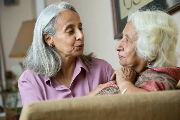 elderly women providing emotional support to each other through friendship