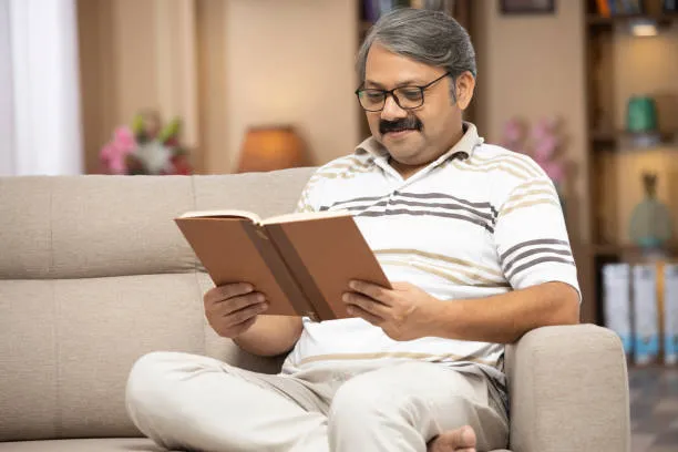 Residents enjoying hobbies like reading, gardening, and painting to foster social connections