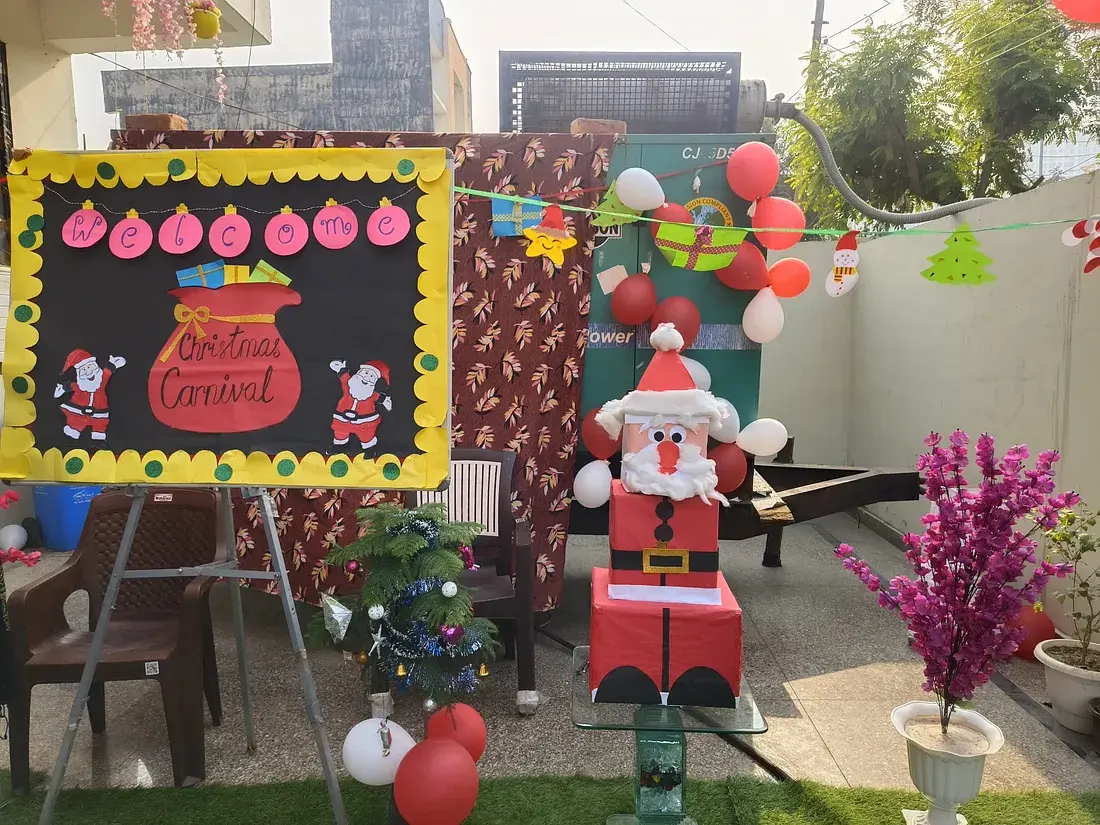 Residents unwrapping Christmas gifts at Ashirwad Elders Home