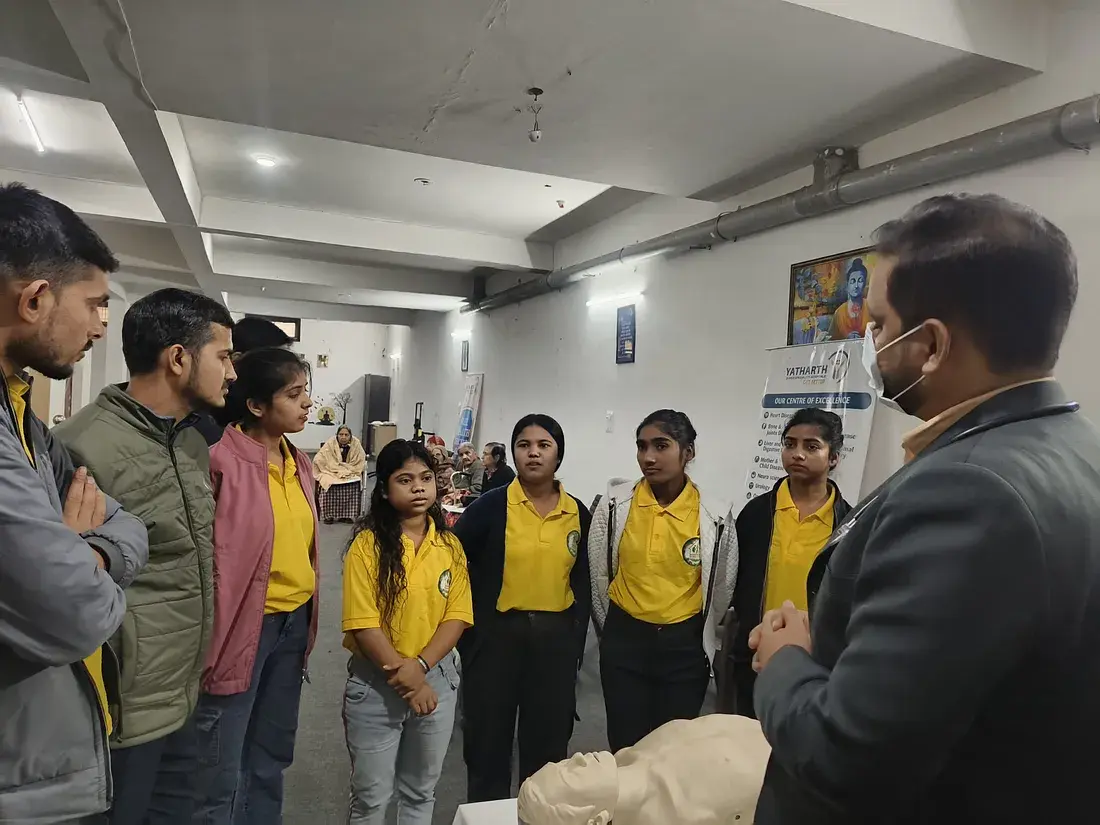 Staff members receiving training from Yatharth Health experts