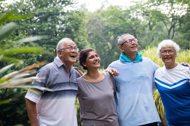 Seniors socializing and engaging in activities at an old age home